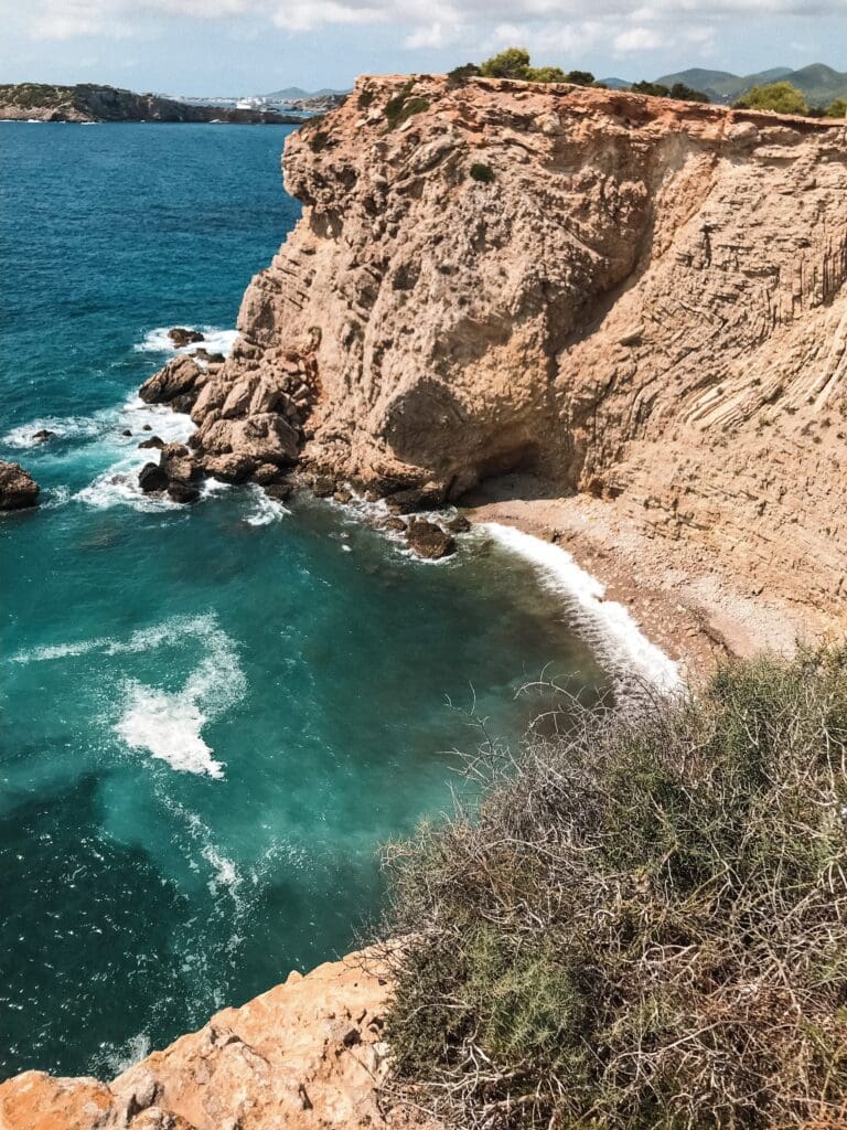 Scenic cliffside view in Ibiza, symbolizing self-discovery, mindfulness, and the power of nature to heal and restore balance